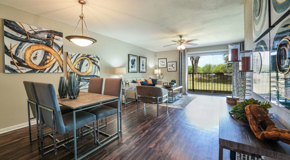 Open living space with access to the balcony at The Madison on the Lake in Houston, Texas