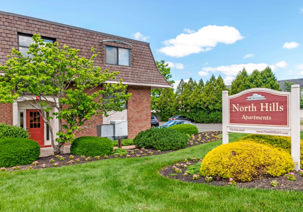 Exterior of North Hills Apartments with pool in Colonia, New Jersey