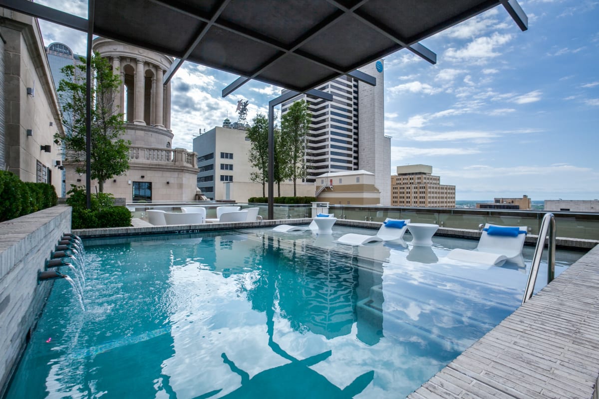 Swimming pool with views of the city at The Drakestone in Dallas, Texas