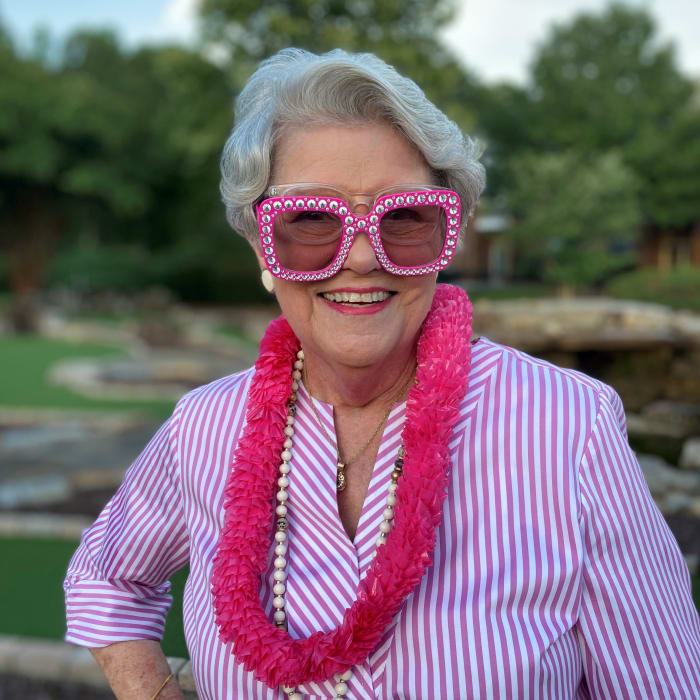 Resident with fun glasses on for a social event at Presbyterian Communities of South Carolina in Columbia, South Carolina