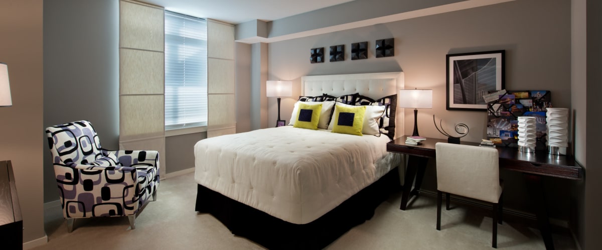 Modern and airy bedroom at Solaire 1150 Ripley in Silver Spring, Maryland