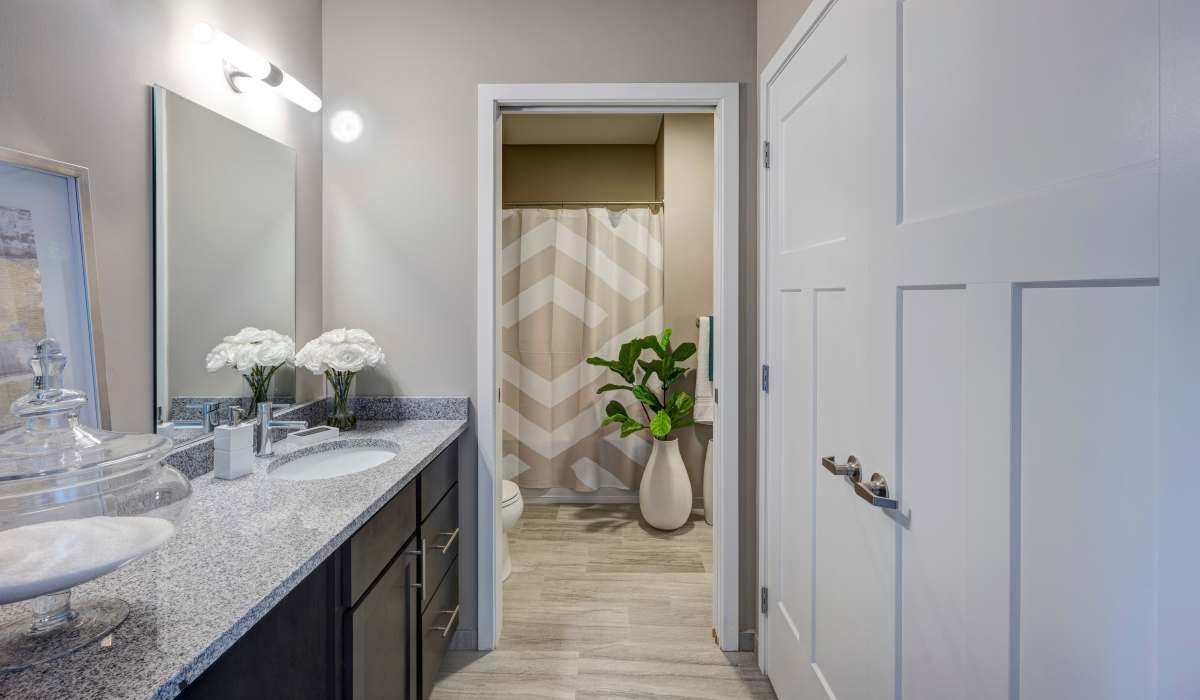 New gray countertop with white flowers and plant at Commonwealth Landing Lofts in Fall River, Massachusetts