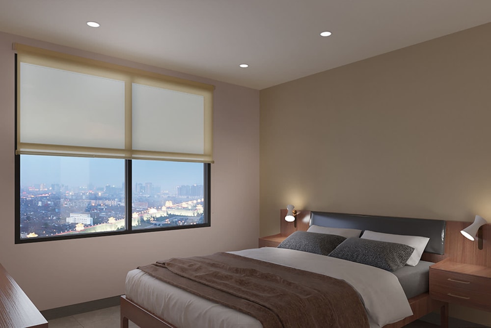 Model home's primary bedroom with a large bay window and terrific view of the city at Thirteen15 in New Orleans, Louisiana