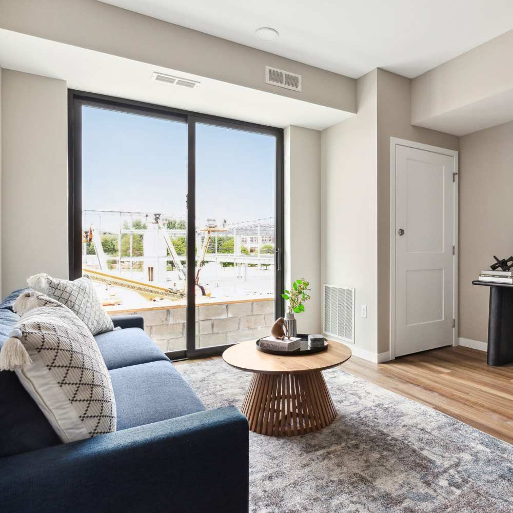 Living room with community view at Oaks Pentagon Village in Edina, Minnesota