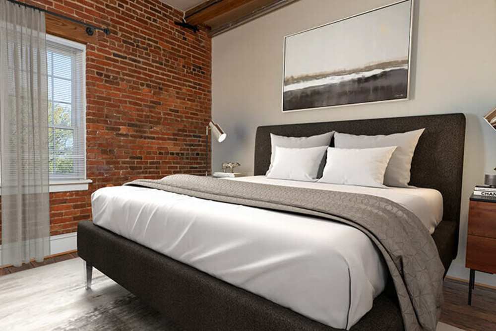 Modern apartment bedroom at High Street Lofts in Petersburg, Virginia