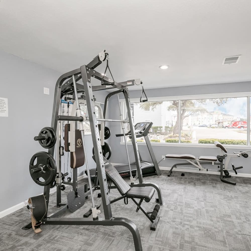 Fitness center with workout machines at Silvermine in Victoria, Texas