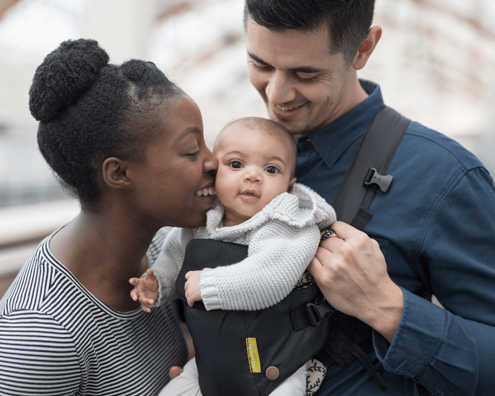 Residents and their baby near at Elite Estate Management LLC in South Bend, Indiana