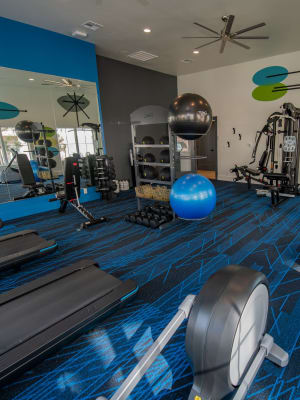 Fitness center at Center 301 Apartments in Belton, Missouri