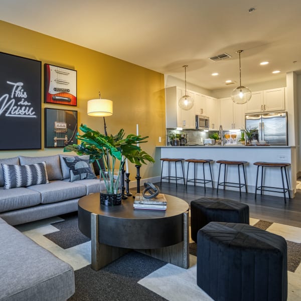 Living room into kitchen at Alexan Tempe in Tempe, Arizona