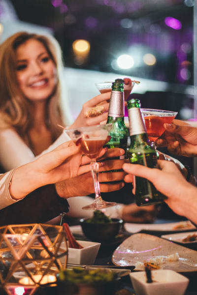 Residents and friends enjoying a drink at a vibrant local bar at Steelyard in Oklahoma City, Oklahoma