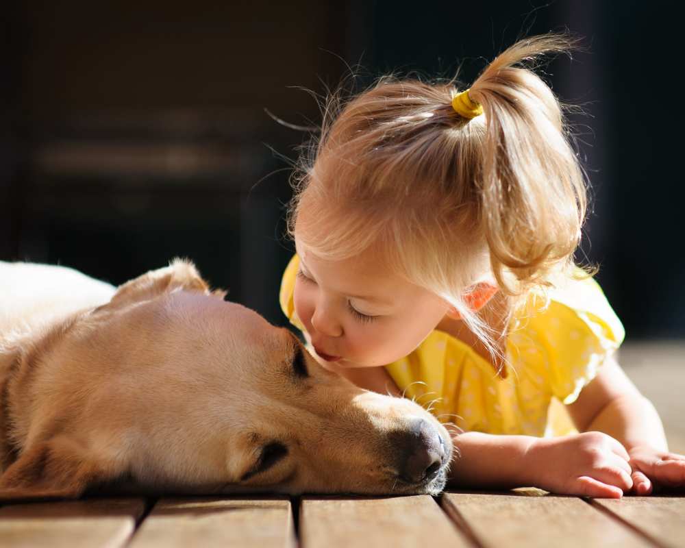 Resident kid with her pet at Regency Apartment Homes in Williston, North Dakota