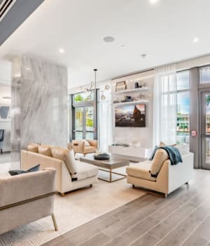 An inviting seating area in the lounge at Marina Del Sol in Sunny Isles Beach, Florida