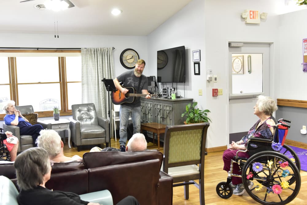 A man performing for the residents at Reflections at Garden Place in Columbia, Illinois. 