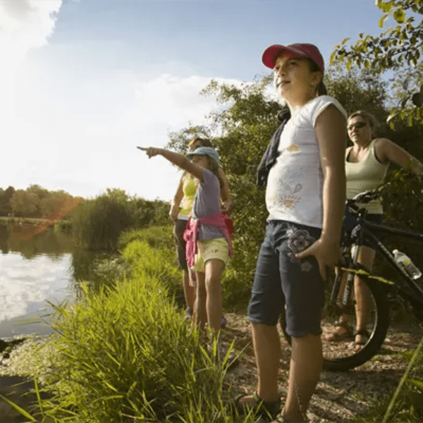Friends on the lakeside at Terraces of Elk Grove in Elk Grove Village, Illinois