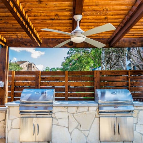Outdoor grilling area at Cottages at Wells Branch in Austin, Texas