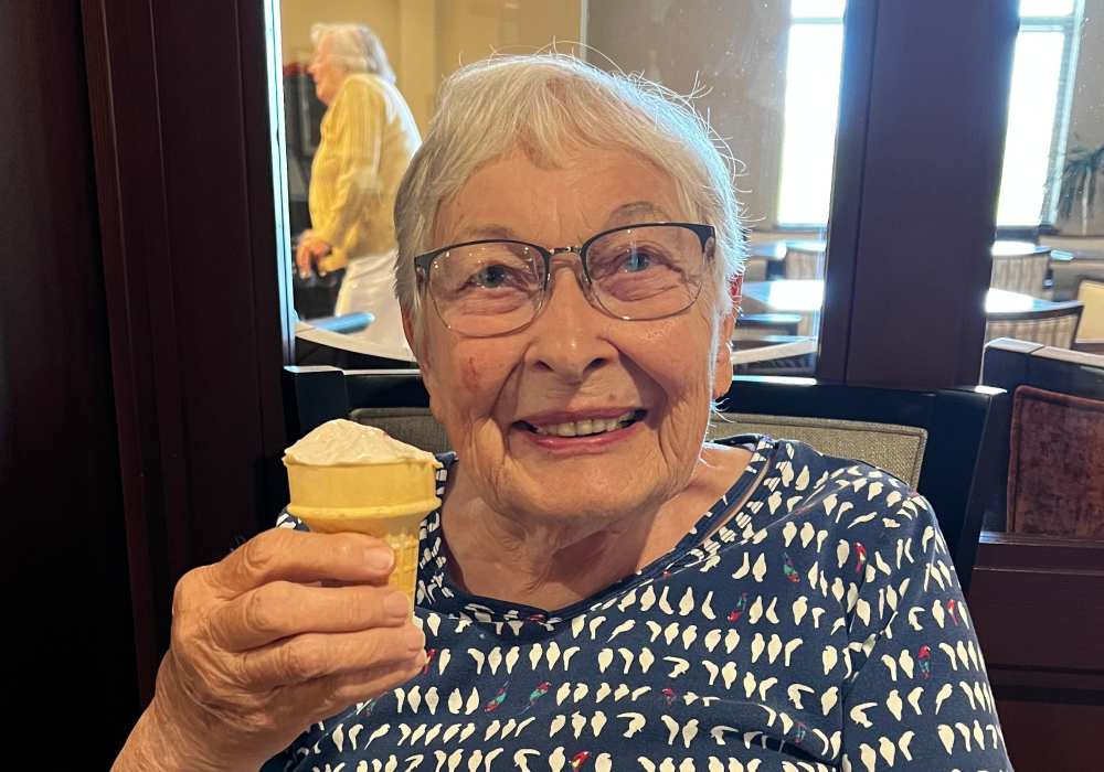 Resident with an ice cream at Merrill Gardens at Tacoma in Tacoma, Washington