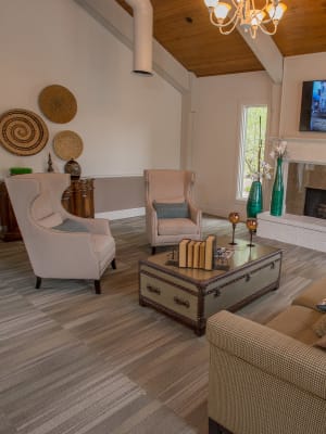 Elegant clubhouse seating with fireplace at Polo Run Apartments in Tulsa, Oklahoma