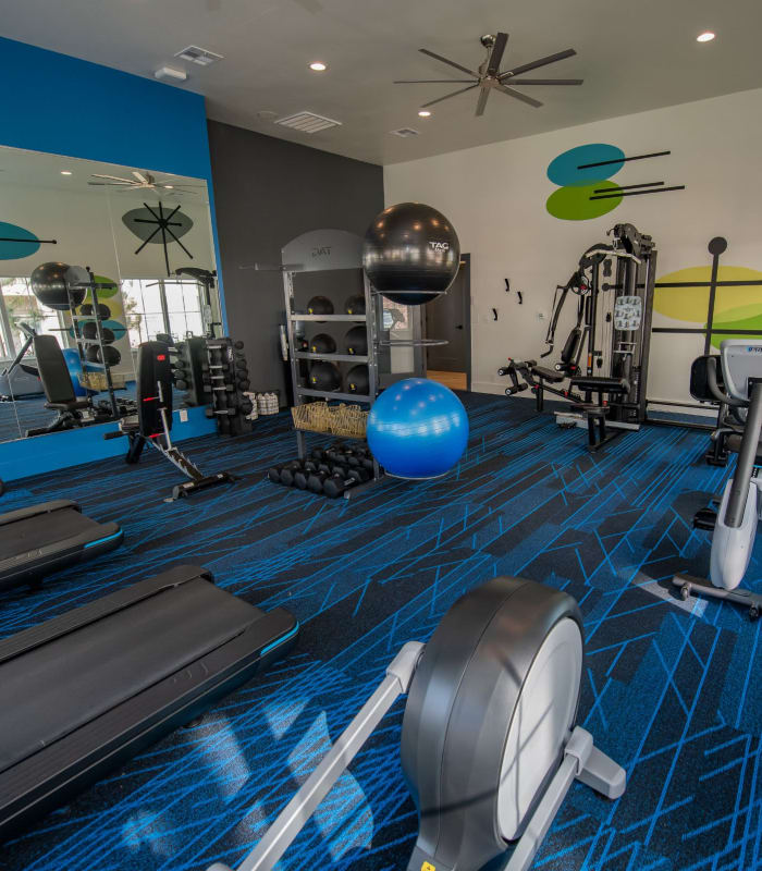 Fitness center at Center 301 Apartments in Belton, Missouri