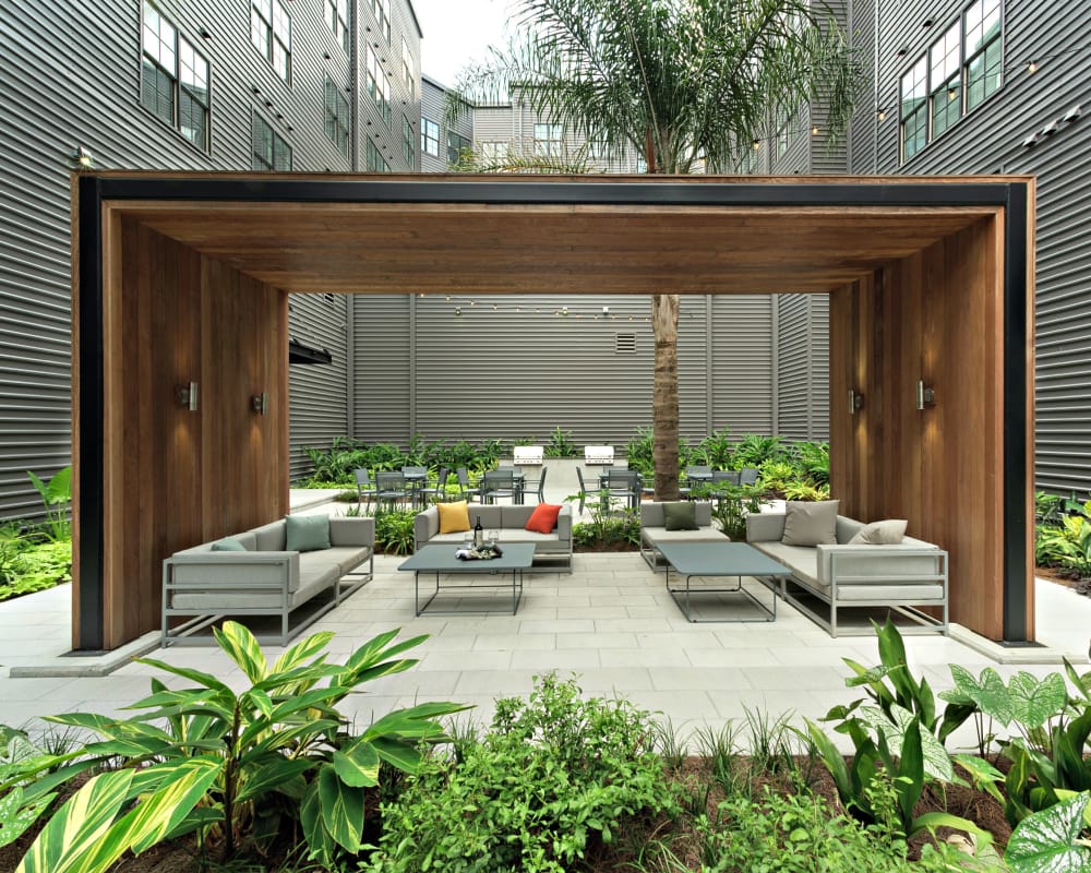 Courtyard with covered seating at The Paramount at South Market in New Orleans, Louisiana