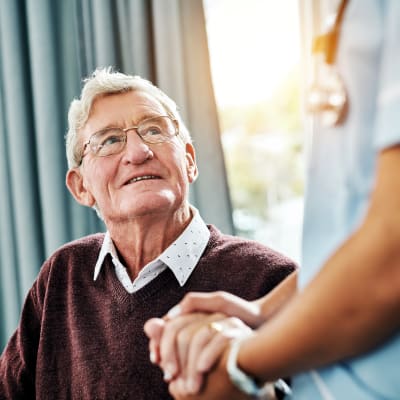 A resident talking to a staff member at Aurora on France in Edina, Minnesota. 