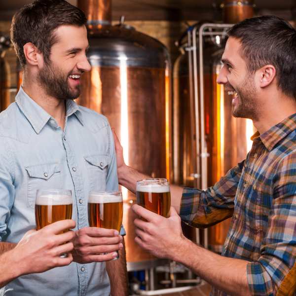 Friends meet for a few beers at a brewery near The Plaza Taos, Chandler, Arizona