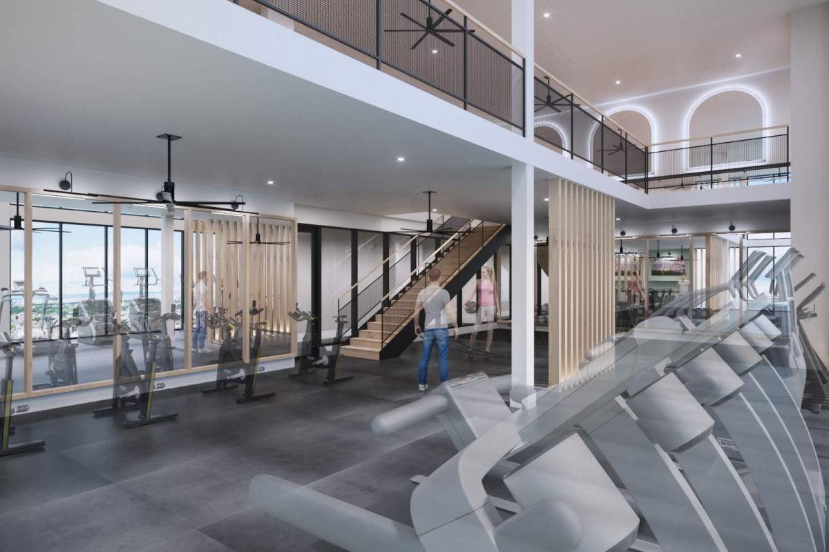 Fitness center with workout machines at Lantower Midtown in Dallas, Texas