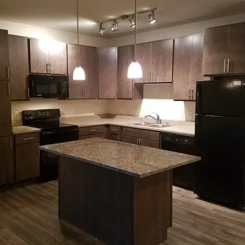 Fully equipped gourmet kitchen at Mill Creek Apartments in Cross Plains, Wisconsin