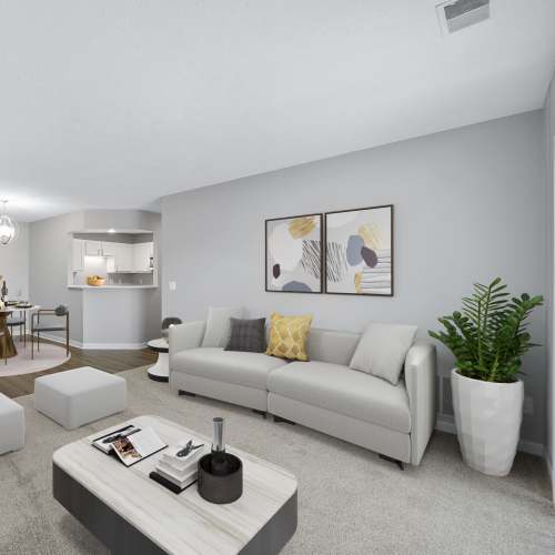 Living room with seating at Indian Footprints Apartments in Harrison, Ohio
