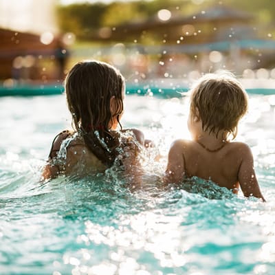 Residents playing on the community pool at Haven at Golf Creek in Portland, Oregon