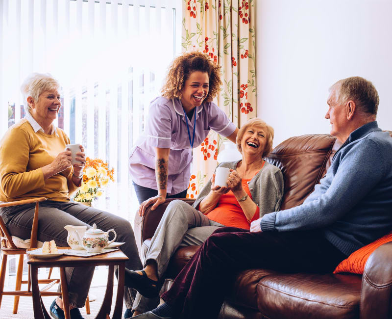 Residents talking over coffee in a lounge at York Gardens in Edina, Minnesota