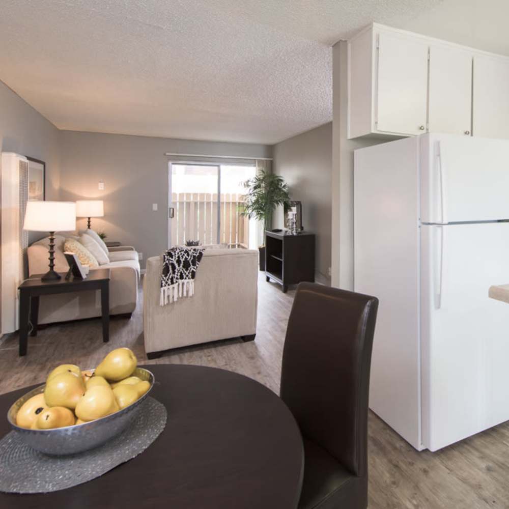 Kitchen connecting to a living room at Lawrence Road Apartments in Santa Clara, California