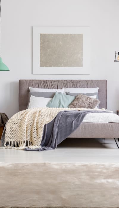 Cozy bed at Ridgecrest in Denton, Texas