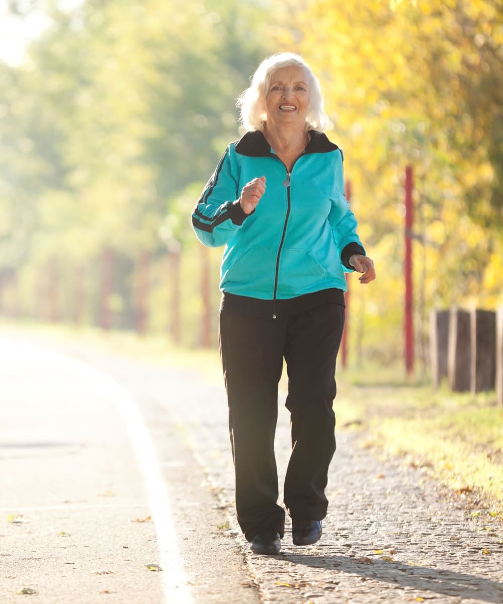 Senior couple jogging together at Tuscany at McCormick Ranch in Scottsdale, Arizona
