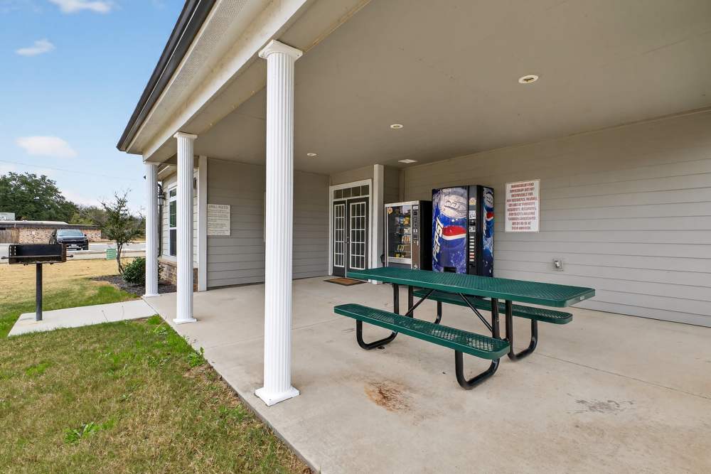 Charming outdoor seating area with a welcoming entrance at Lakewood Crossing in Granbury, Texas.