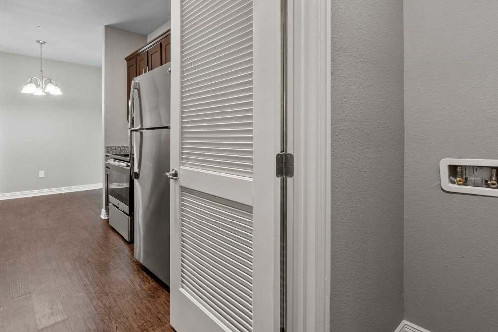 Wood flooring in the apartment kitchen at Pine Creek in Paris, Texas