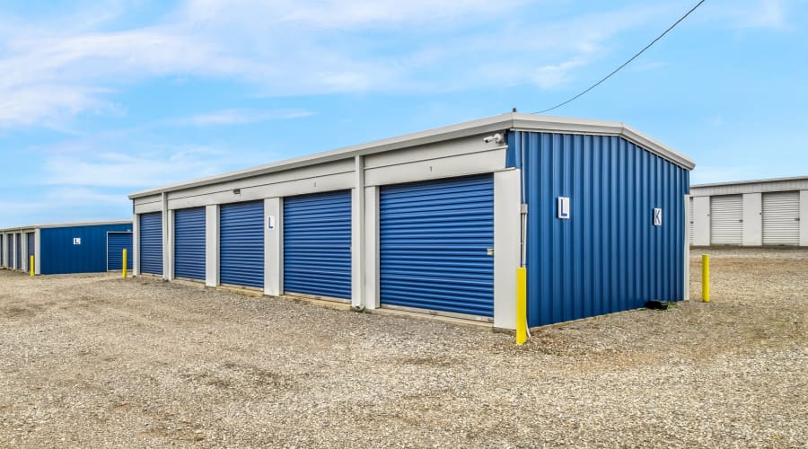 A parent playing with a child in a moving box near KO Storage in Noble, Oklahoma