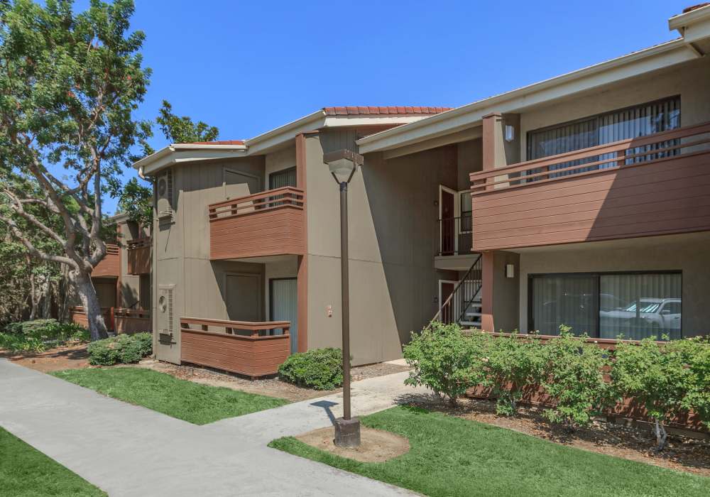 Apartment with private balconies at Parcwood Apartments in Corona, California  
