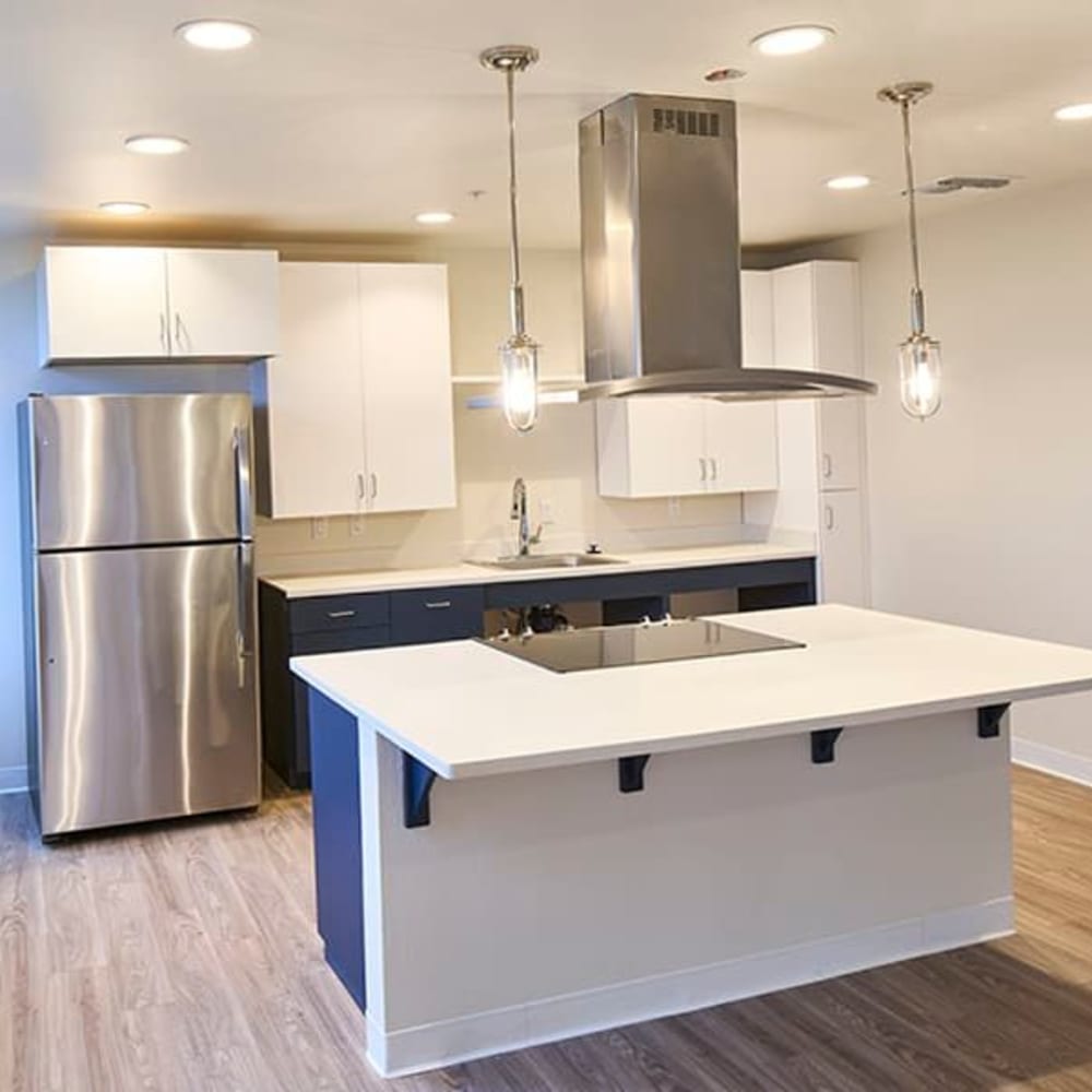 Kitchen with stainless-steel appliances at Casa Querencia, Santa Ana, California