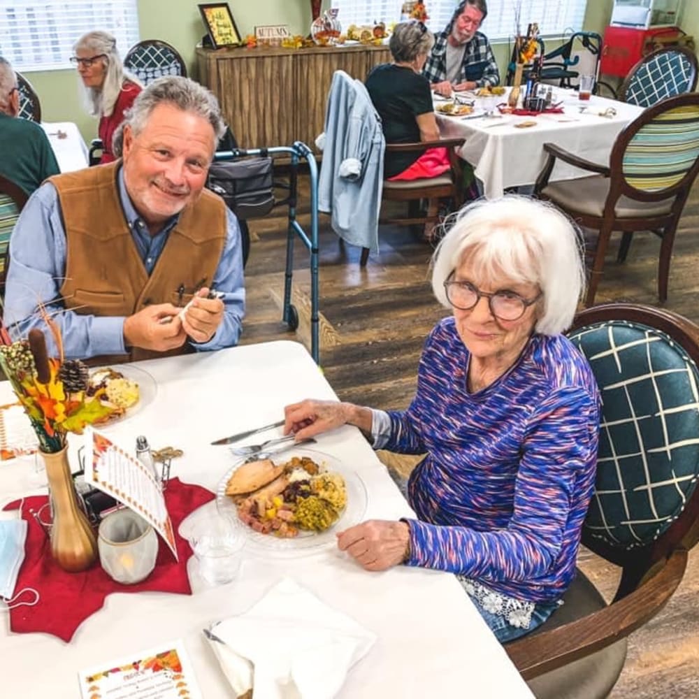 Resident eating a delicious thanksgiving meal at Carolina Gardens at Conway in Conway, South Carolina