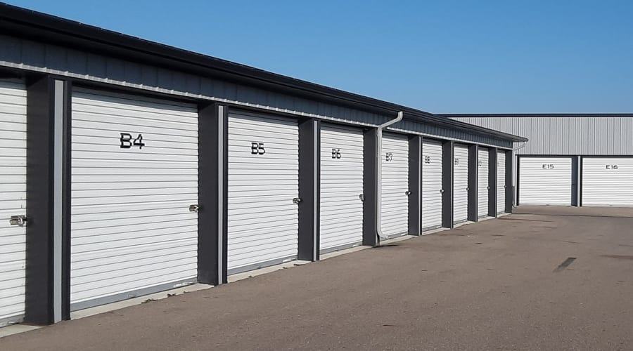 Storage units with blue doors and locks at KO Storage in Owatonna, Minnesota