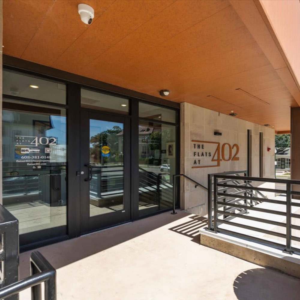 Community entrance with stairs at The Flats At 402 in Madison, Wisconsin
