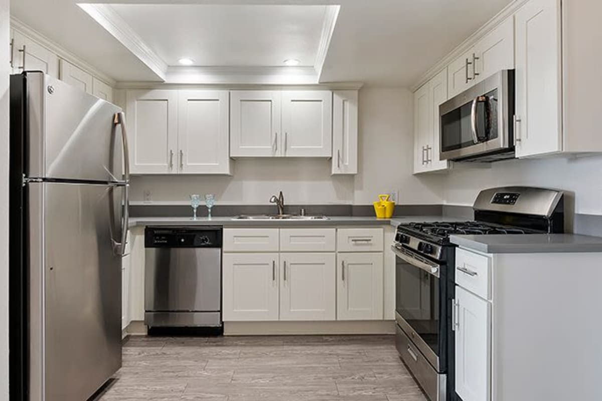 Modern kitchen at Kingsley Drive Apartments, Los Angeles, California