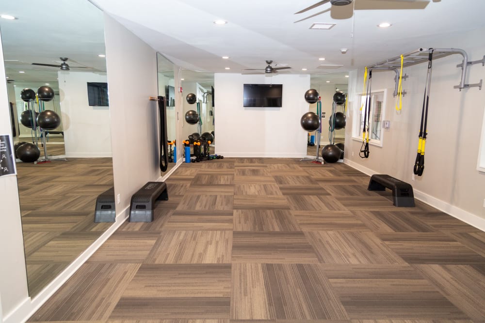 A spacious community gym at Sunbrook Apartments in Saint Charles, Missouri