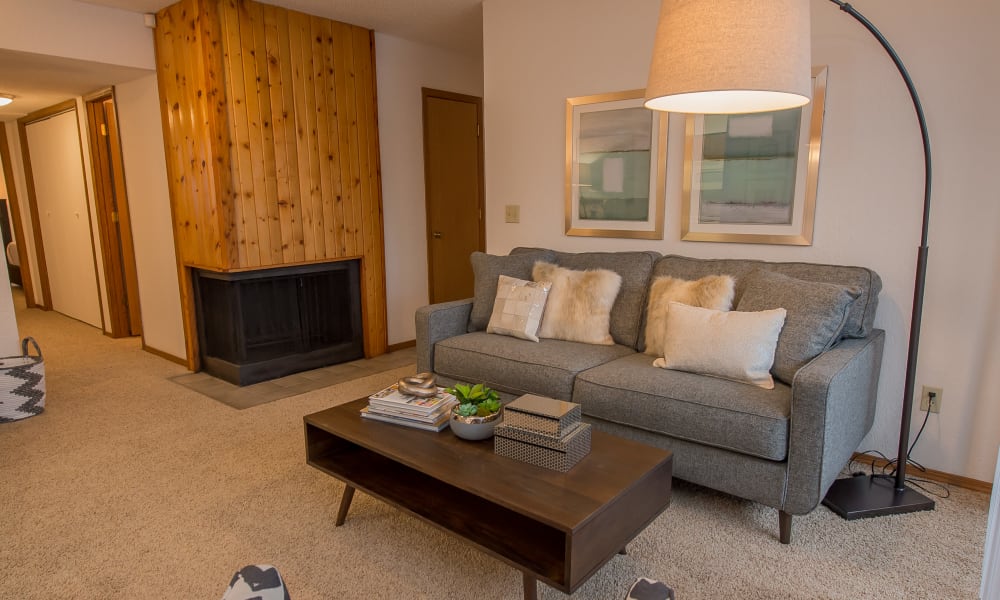 Open and bright model living room at The Warrington Apartments in Oklahoma City, Oklahoma