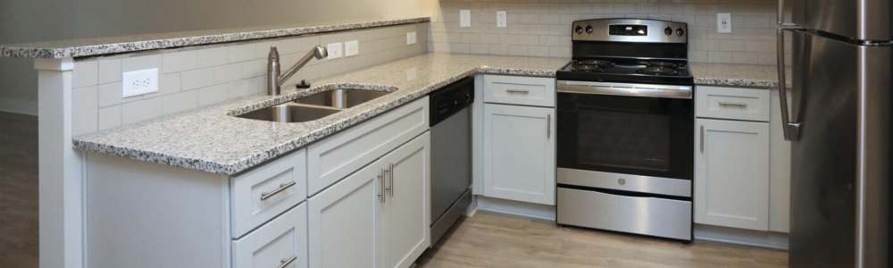 A kitchen at Keystone At James Landing in Jamestown, North Carolina