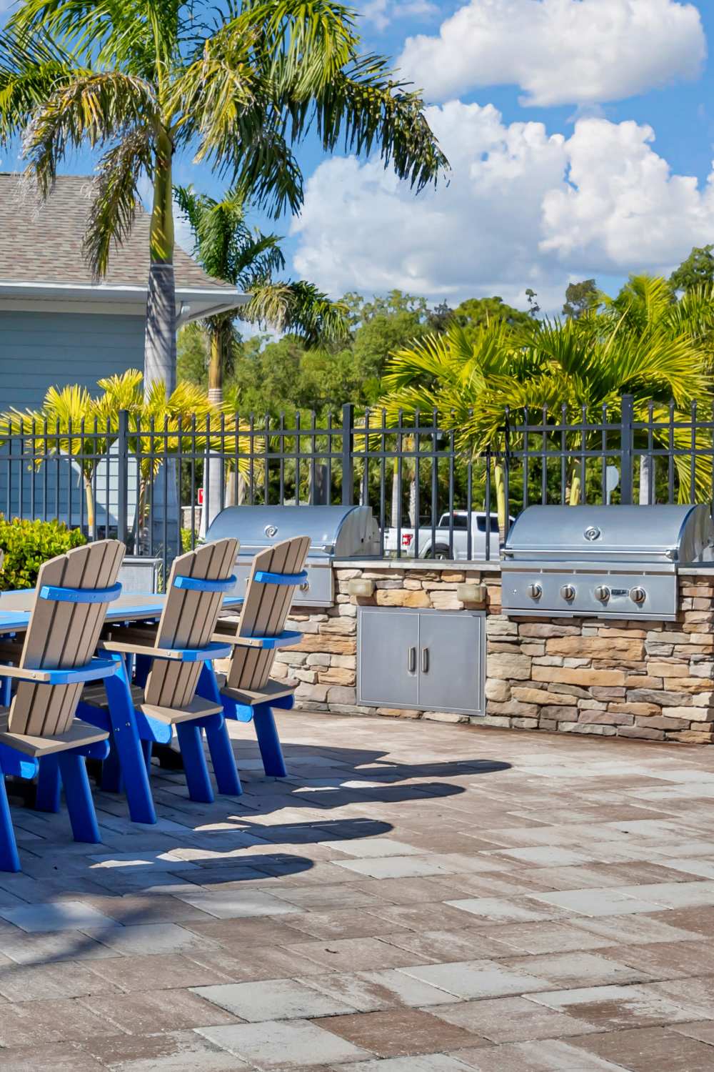 Outdoor grilling area at The Carlton of Fort Myers in Fort Myers, Florida