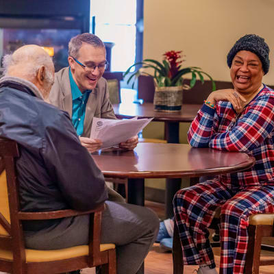 Residents gathering together at Cascade Park Gardens Memory Care in Tacoma, Washington