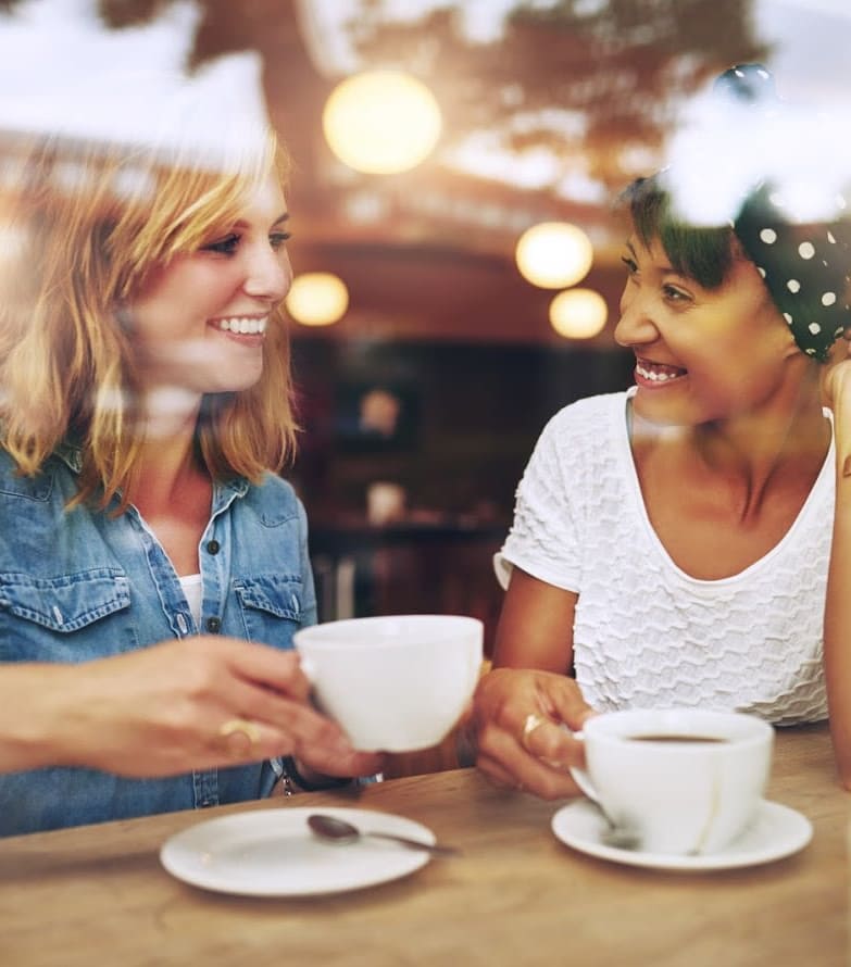 Friends having coffee together at The Mill at First Hill in Seattle, Washington