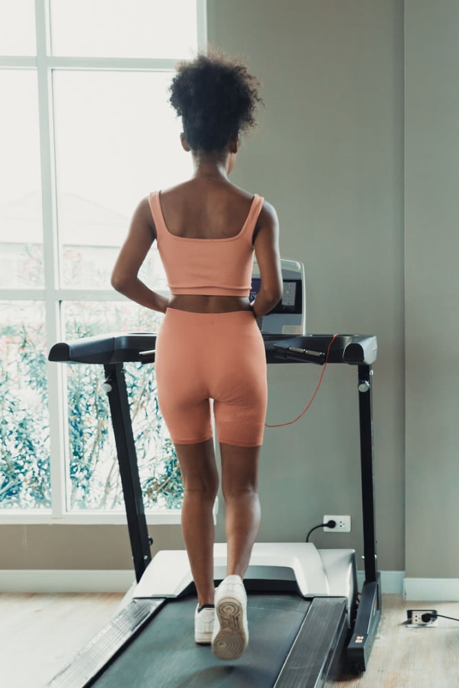 Resident on a treadmill at Lakewood Park Apartments in Lexington, Kentucky