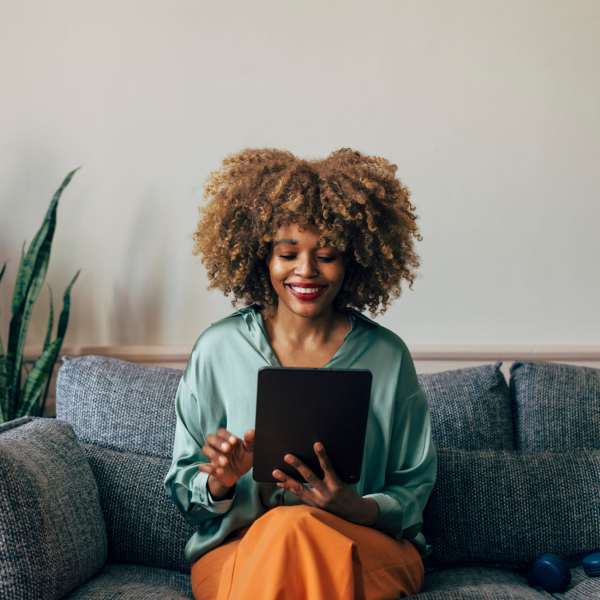 Woman working on a tablet at Darby Development in Mount Pleasant, South Carolina